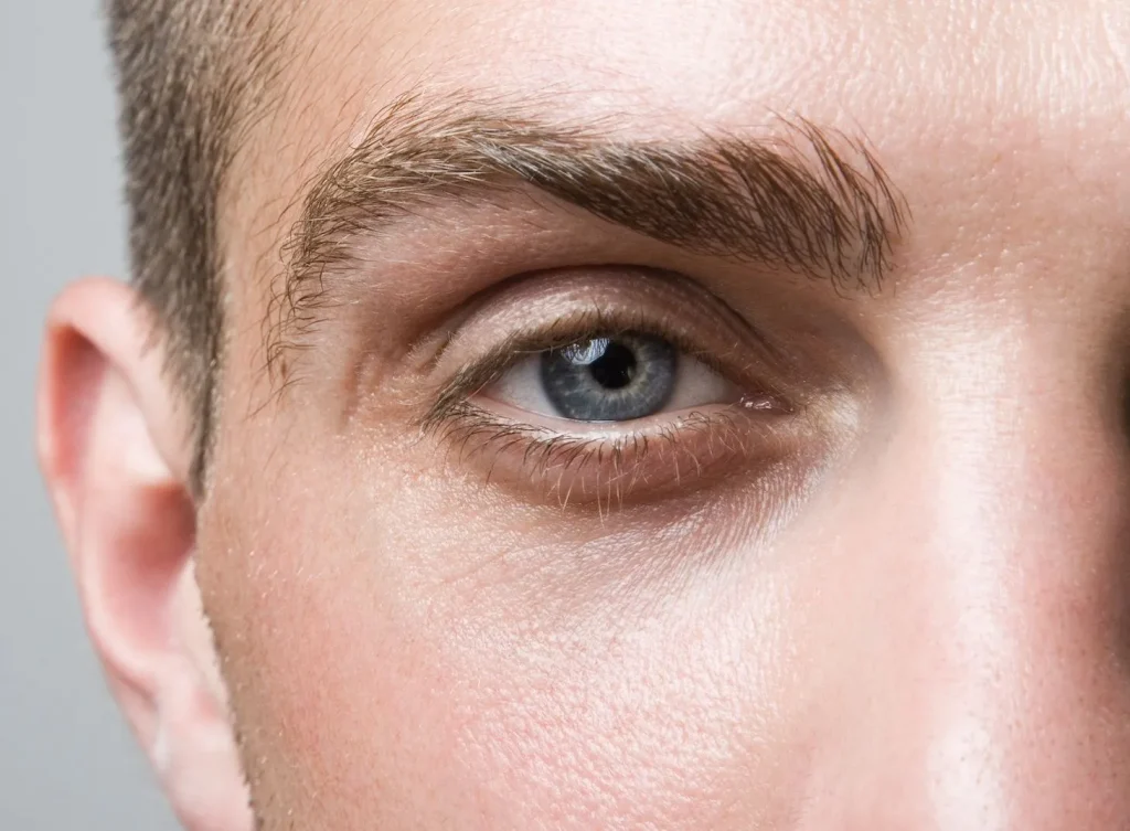 a close up of a man's eye