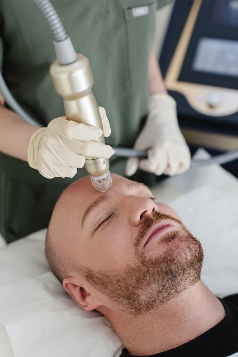 a man receiving a facial treatment